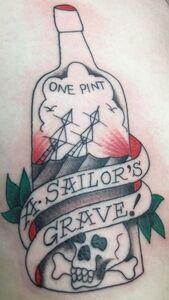 Tattoo of a bottle with